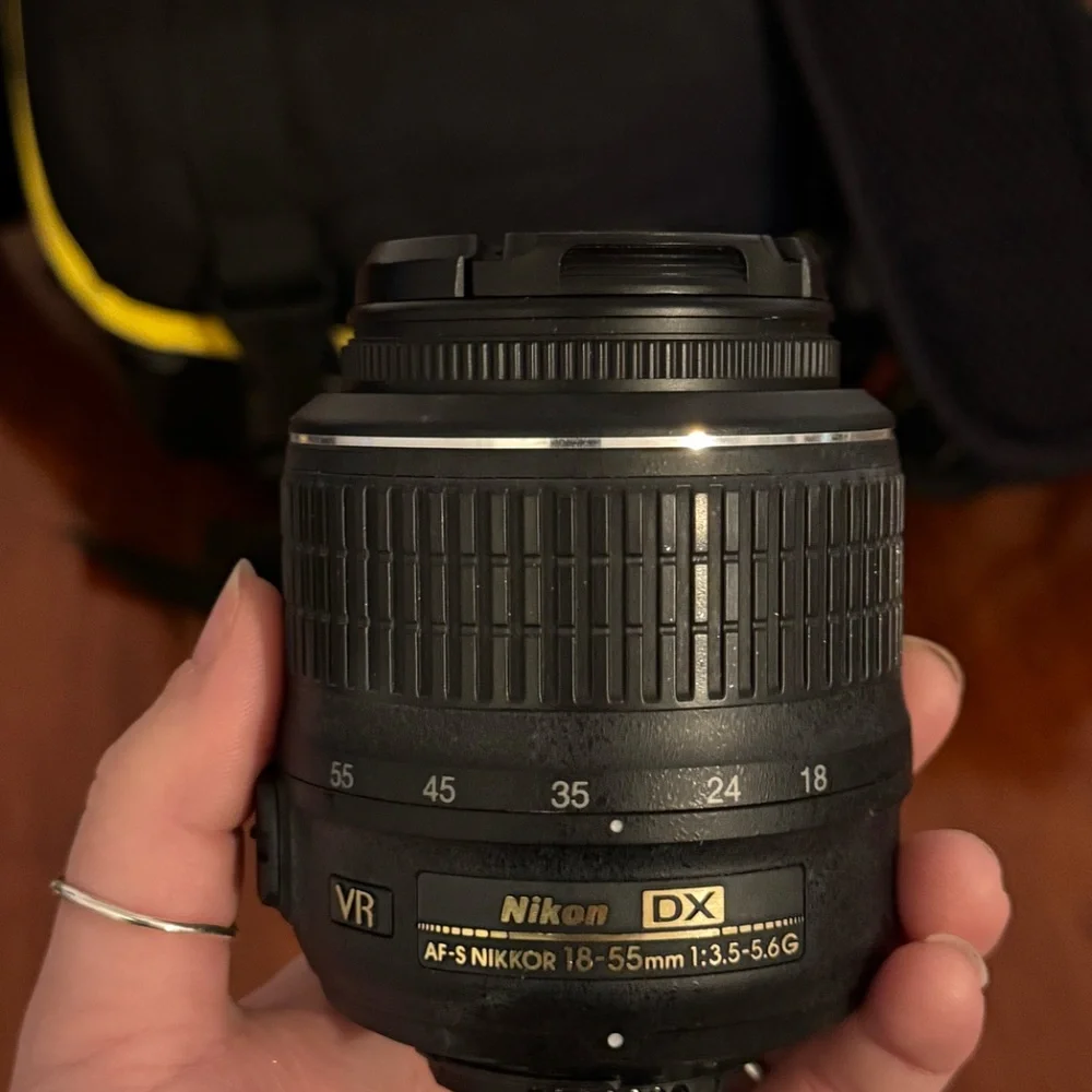 Nikon D3100 with 18-55mm lens + 55-200mm lens
